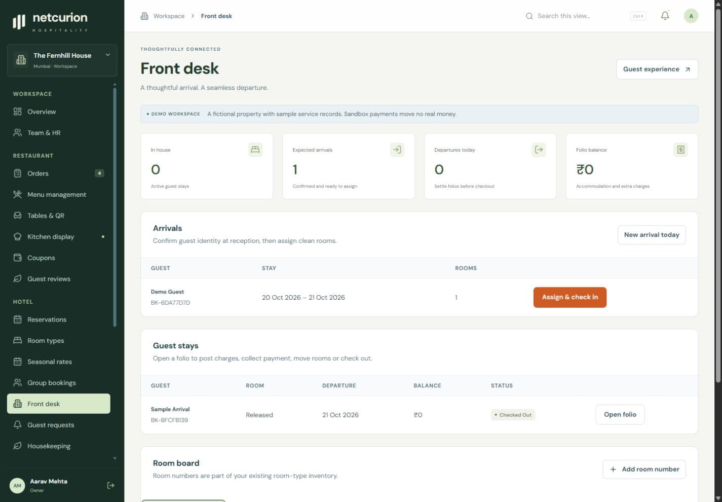 Hotel reception panel showing sample arrivals, guest stays, and the room board